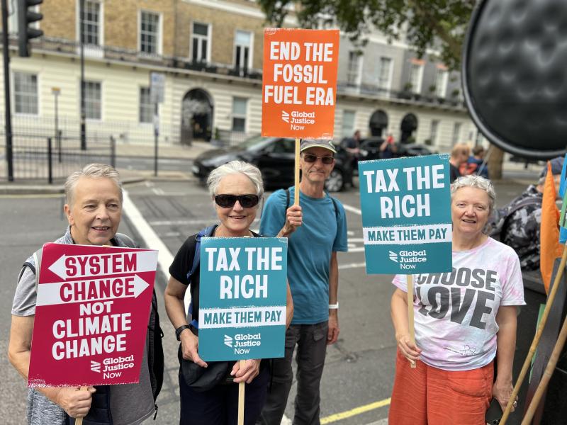 Make Them Pay climate demonstrators