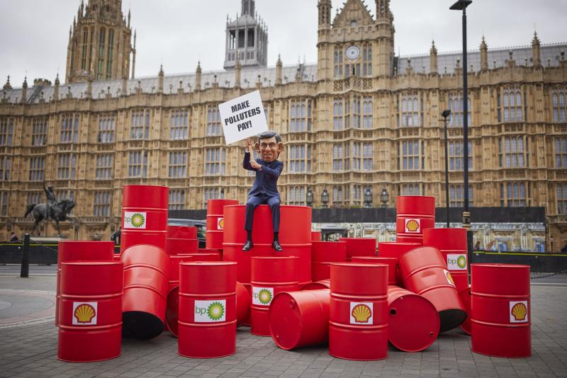 Make Polluters Pay stunt outside parliament