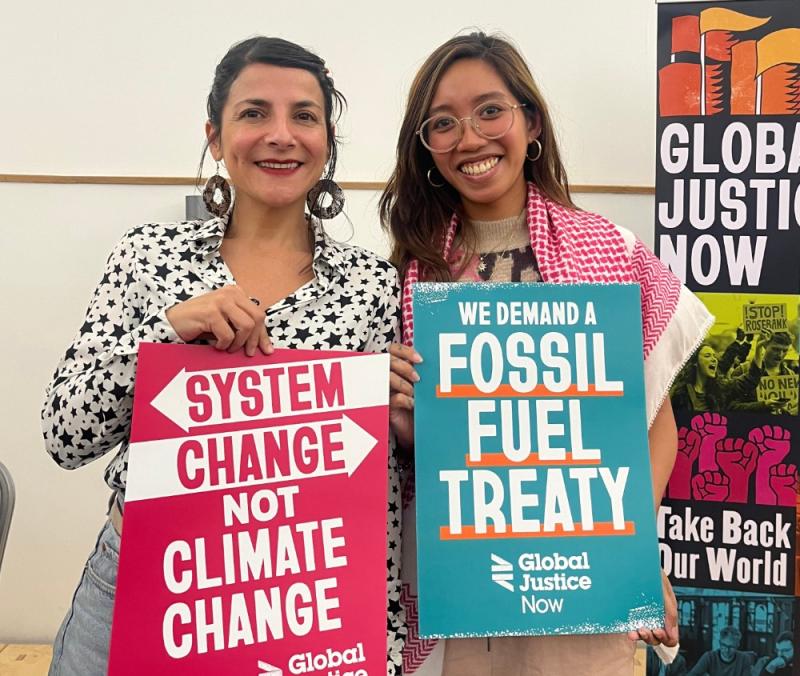 Climate speaker Mitzi Jonelle Tan with placard